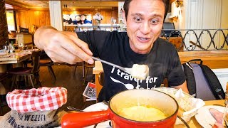 Swiss Food Tour  CHEESE FONDUE and Jumbo Cordon Bleu in Zurich Switzerland [upl. by Ahsikram222]